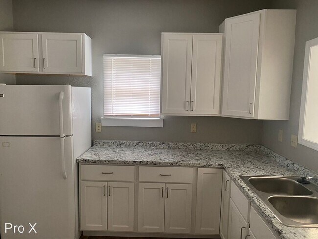 Building Photo - 4 br, 3 bath House - 411 W. 4th