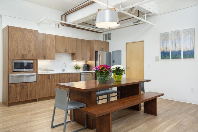 Community Room Kitchen for Entertaining Larger Groups - Grand Lowry Lofts