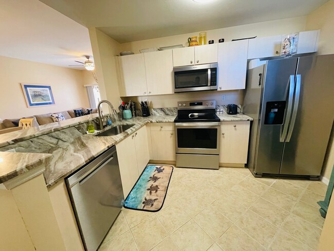 Building Photo - Spacious 3-Bed, 2-Bath Condo in Bellamar a...