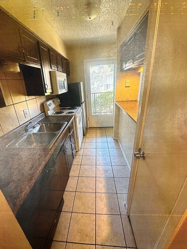 Photo - Cute and Efficient with covered parking House