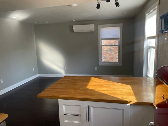 Photo - Two unit building with shared laundry and entryway Townhome