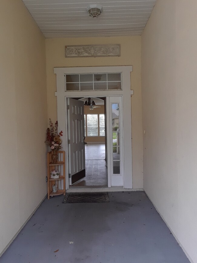 Entry through large front porch - 2692 Creekfront Dr