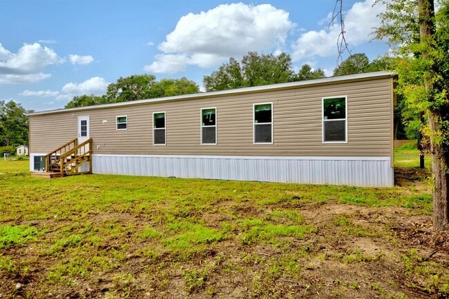 Building Photo - 8595 NW 13th Ct