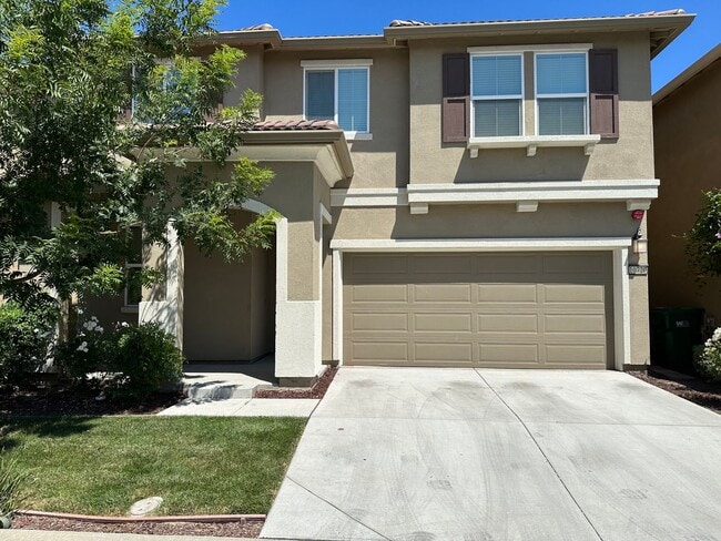 Building Photo - Stunning 4 Bedroom, 3 Bath Gated Community W/ Solar