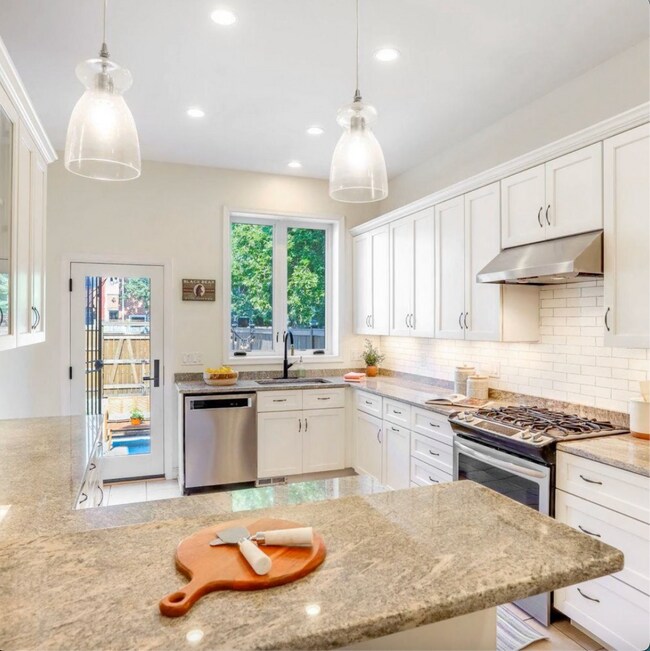 Spacious kitchen with lots of light - 1630 6th St NW