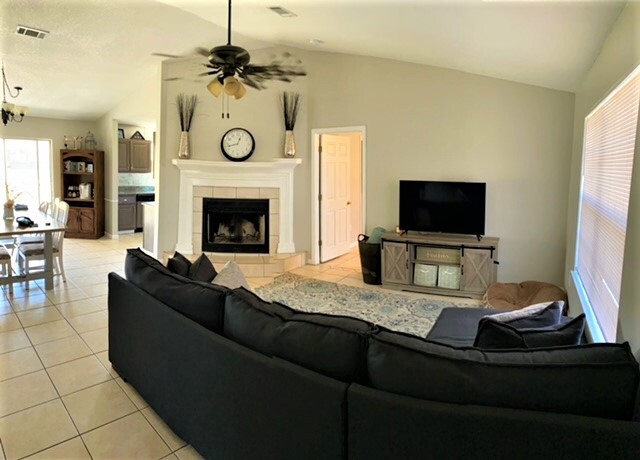 Living room w/fireplace - 7699 Sandstone St