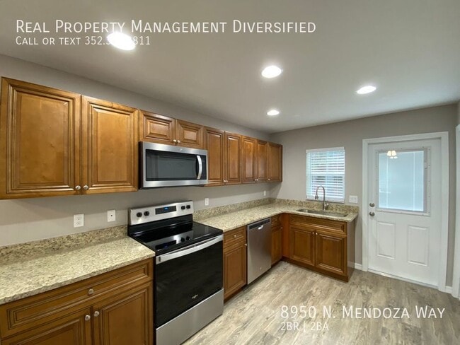 Building Photo - 8950 N Mendoza Way