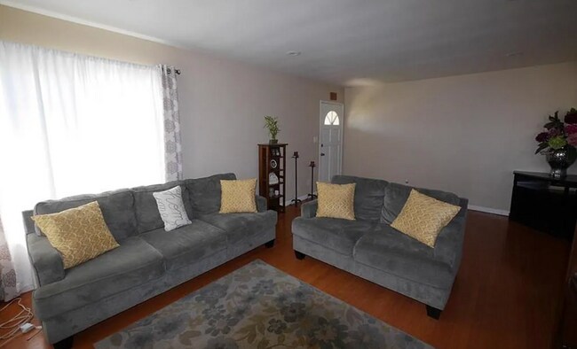 Sala de estar (interior) - 327 E Collins Ave