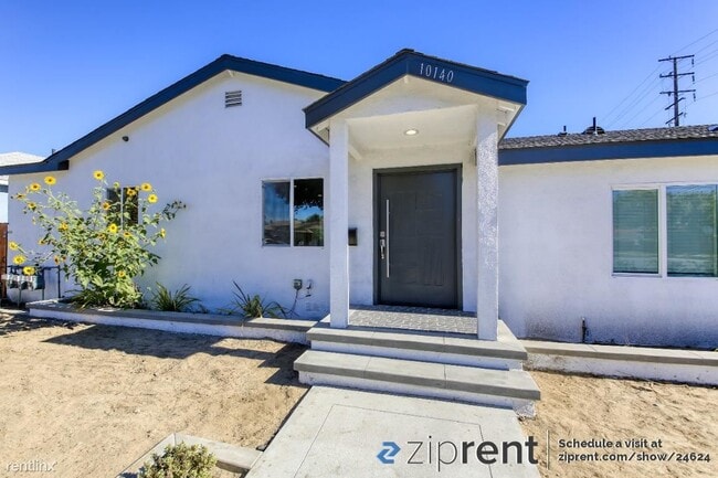 Building Photo - 3 br, 2 bath Triplex - 10140 Alexander Ave...