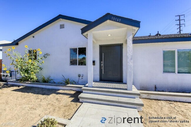 Foto del edificio - 3 br, 2 bath Triplex - 10140 Alexander Ave...