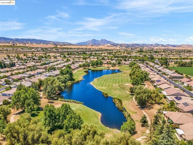 Building Photo - Single story home available in 55+ Community!! Rear view of orchard, privacy, and peace galore!