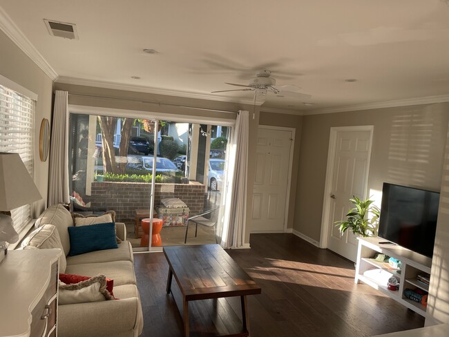 Living Room with view of front door and master bedroom door - 417 Olmsted Park Pl