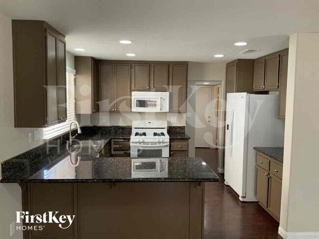 Foto del edificio - 6067 Hidden Rock Dr