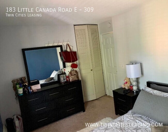 Building Photo - Amenities include a pool, sauna, garage pa...