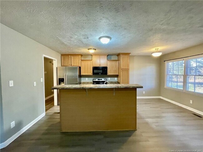 Foto del edificio - 6928 Bostick Dr