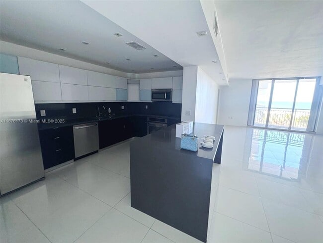 Building Photo - 5825 Collins Ave