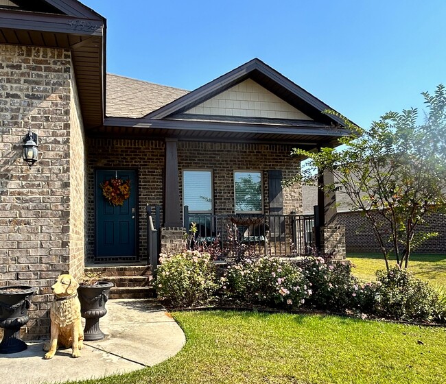 Elevated front porch with railings for safety - 31524 Plover Ct