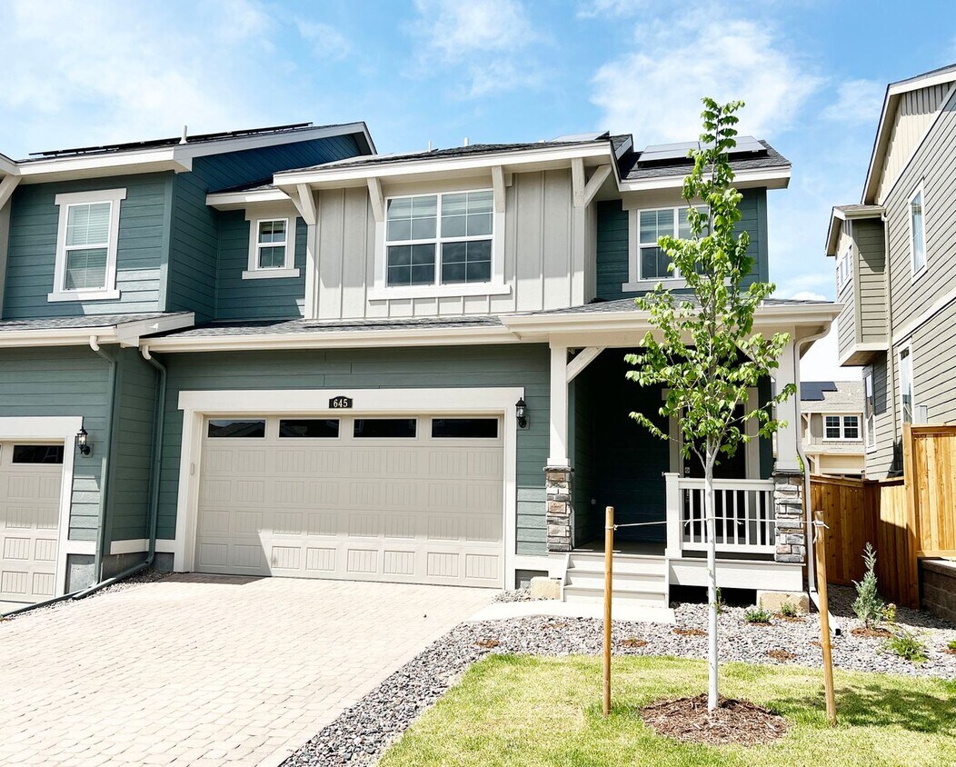 Primary Photo - Brand New Home with a Fenced Yard and Cove...