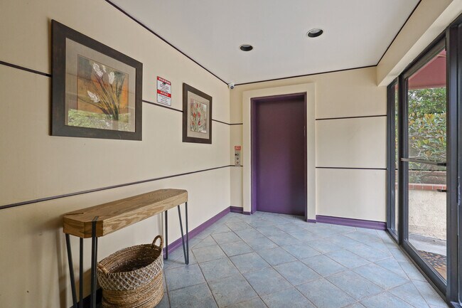 Lobby Entrance and Elevator - Overland Century