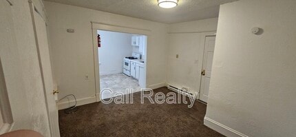 Building Photo - 1421 W Maxwell Ave
