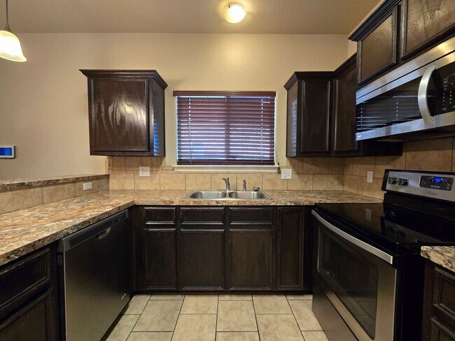 Building Photo - RENT REDUCTION - AVAILABLE NOW!