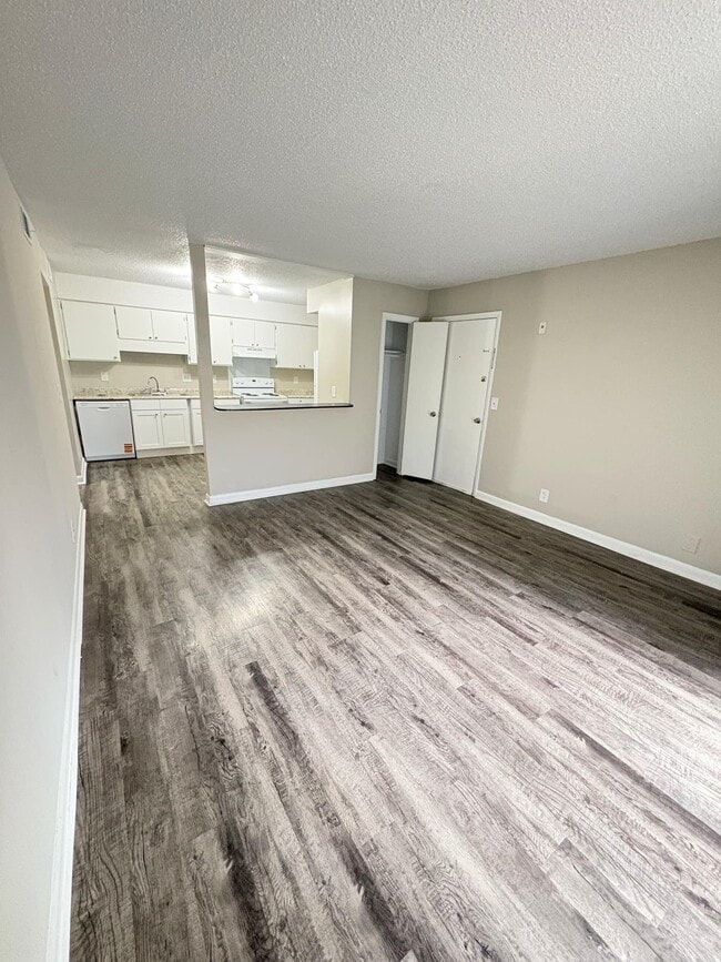 1 dormitorio, sala de estar - Horizon Park Apartments