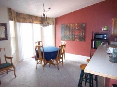 dining area by open kitchen & patio - 1800 S Grant Ave