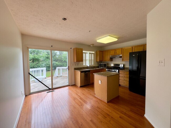 Foto del edificio - Charming 2-Bedroom Single Family Townhome ...