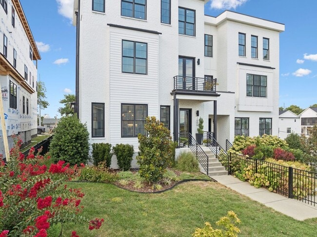 Photo - Experience elevated living in this beautifully crafted brick residence located in the heart of Ed... House