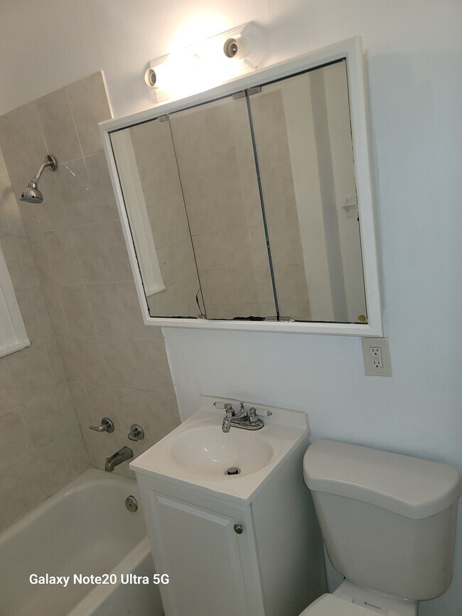 Bathroom all white. - 4749 N 36th St