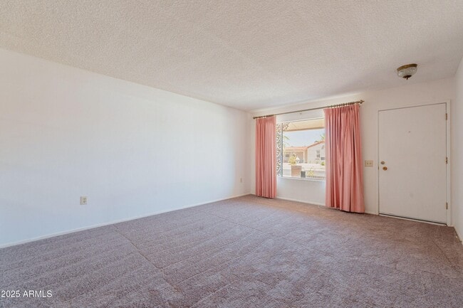 Building Photo - 10733 W Loma Blanca Dr