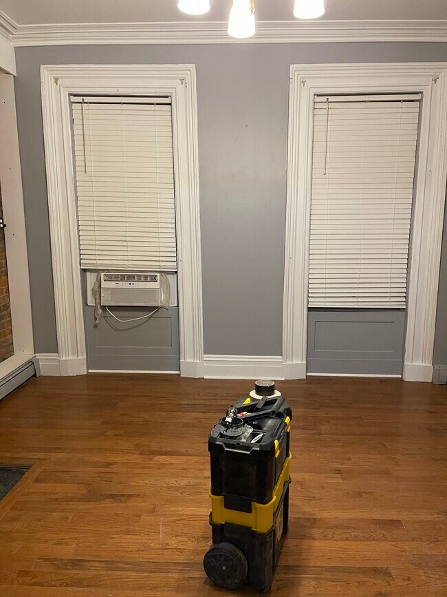 Living room with cordless 2in blinds - 31 Clinton Ave