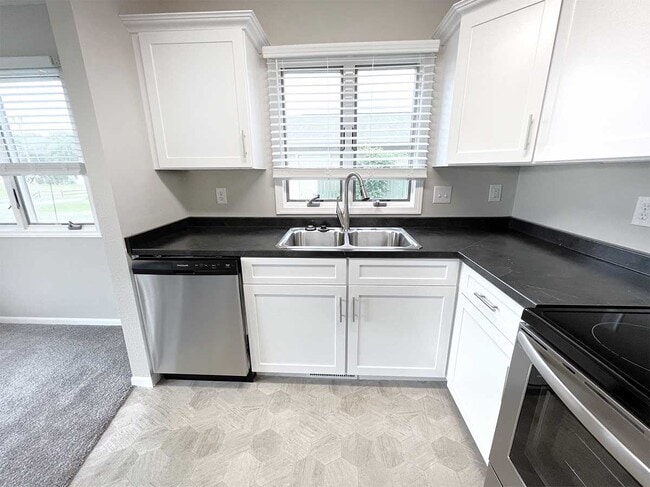 Condo kitchen - 2100 Springport Apartments