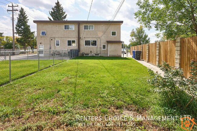 Building Photo - Pet Friendly Half Duplex with Fenced Yard