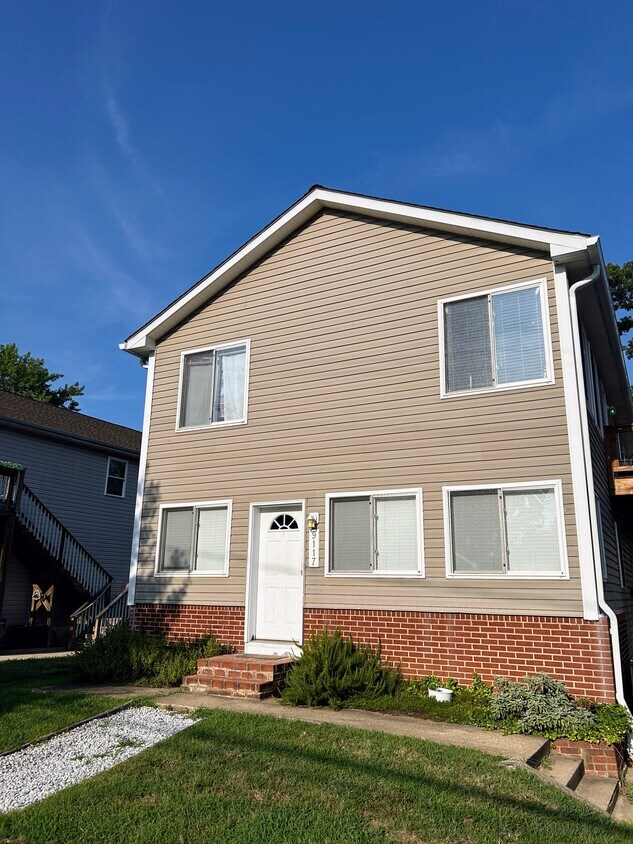 Exterior Front with Parking - 9117 Dayton Ave