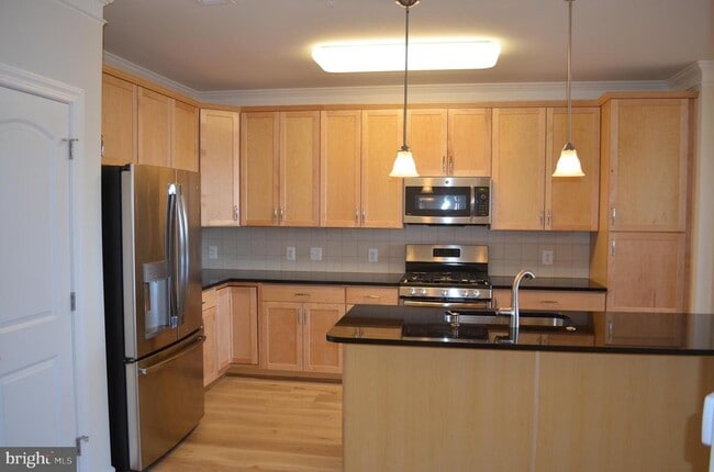 Building Photo - 13724 Neil Armstrong Ave