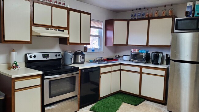 kitchen with stainless steel appliances - 200 Pheasant Run Dr