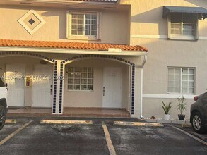 Building Photo - 10101 W Okeechobee Rd