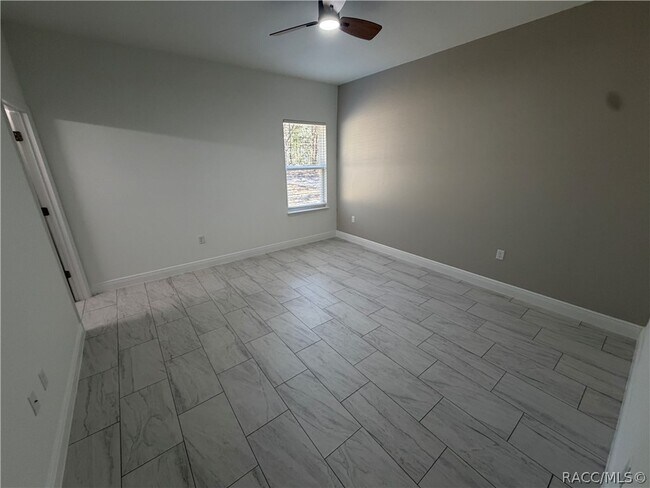 Building Photo - 8587 N Spikes Way