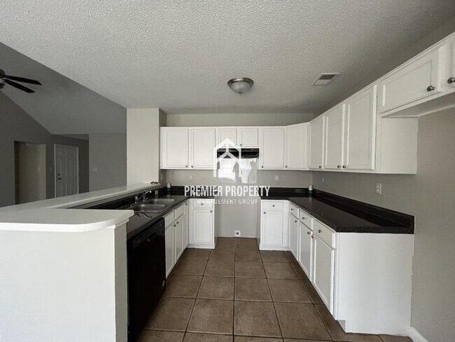 Building Photo - 6982 Luxor Ln