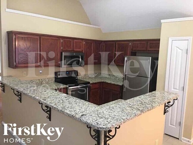 Building Photo - 4143 Ravenwood Dr N