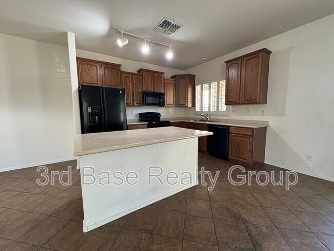 Building Photo - 17728 W Acapulco Ln
