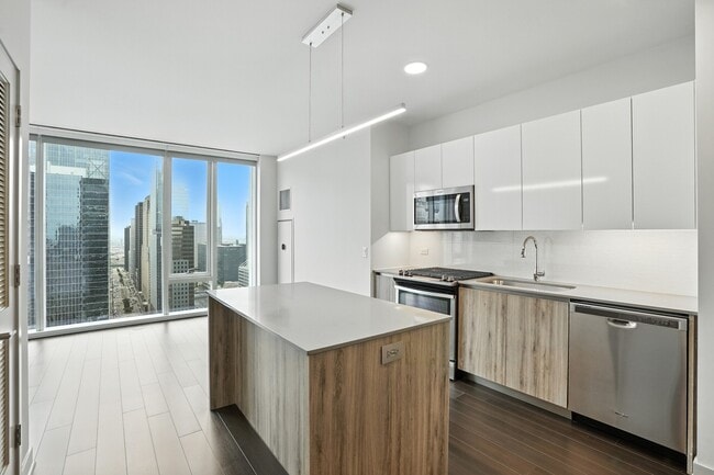 Building Photo - 311 W Wolf Point Plaza