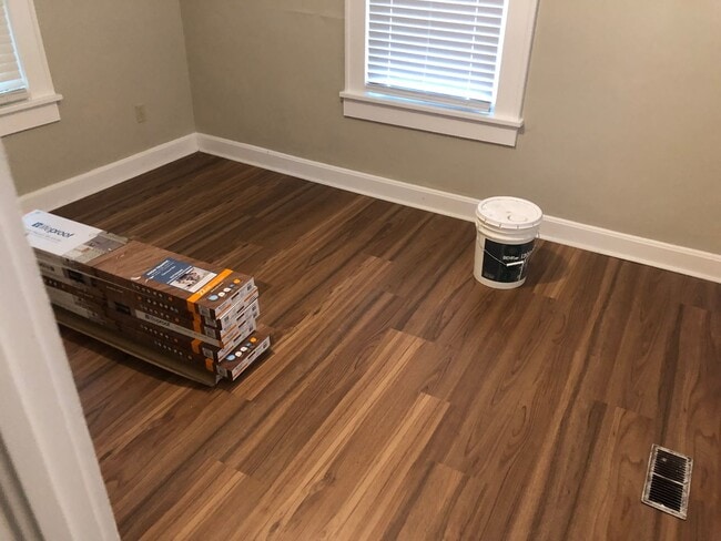 Photo - Freshly Painted 2x1 with Brand-New Plank F... House