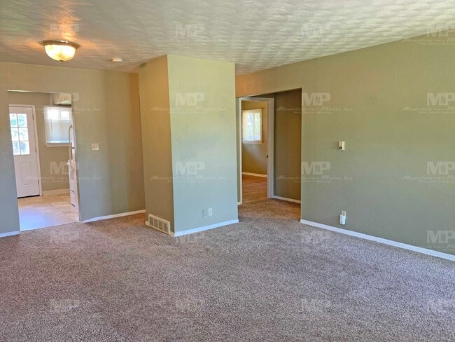 Building Photo - 1020 N Taft Hill Rd