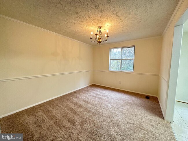 Foto del edificio - 5857 Chrysanthemum Dr