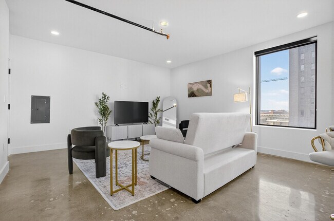 Foto del edificio - 116 W 3rd St