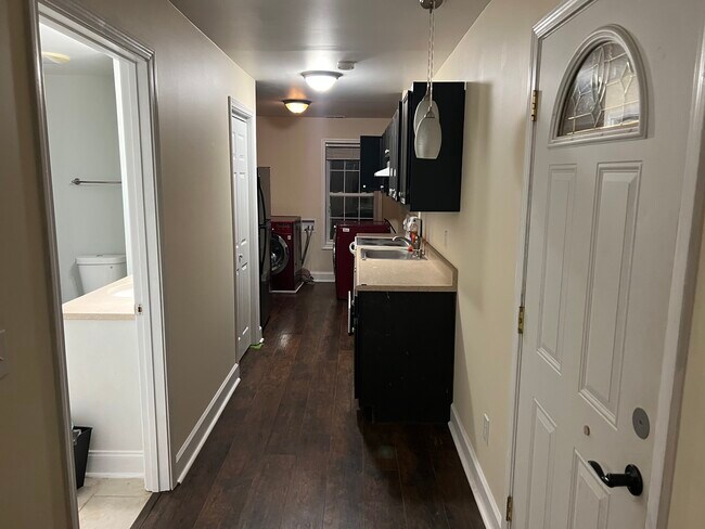 Entrance and view of kitchen. - 7835 Rose Ct