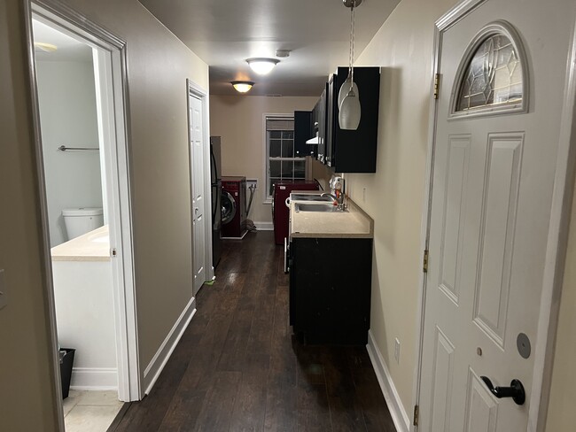 Entrance and view of kitchen. - 7835 Rose Ct