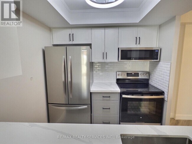 Photo du bâtiment - 8351 McLaughlin Rd S